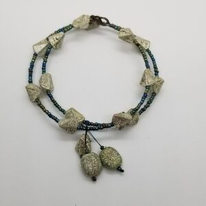 oil slick seed beed and silver wrap bracelet